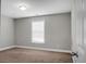 Bedroom with carpeted floor, window and doorway that lets in ample light at 504 Foxbank Plantation Blvd, Moncks Corner, SC 29461