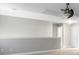 An empty hallway is freshly painted with neutral colors, and awaiting personal touches at 504 Foxbank Plantation Blvd, Moncks Corner, SC 29461