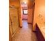 Bathroom with tiled floors, shower, window, and vanity, all with traditional fixtures at 6935 Hickorynut Ln, Ravenel, SC 29470