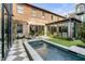 Backyard featuring a pool, patio, and outdoor living space, ideal for entertaining guests at 70 King St, Charleston, SC 29401