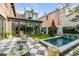 Luxurious backyard featuring a pool, patio, and outdoor living space perfect for relaxation at 70 King St, Charleston, SC 29401
