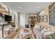 Cozy living area with unique decor, featuring a comfortable seating area and a modern sauna at 70 King St, Charleston, SC 29401