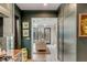 Cozy living room with hardwood floors flows from kitchen with views to outdoor living space at 70 King St, Charleston, SC 29401