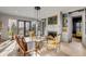 Bright and airy living room featuring a fireplace and large glass doors leading to the outside at 70 King St, Charleston, SC 29401
