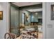 Well-equipped prep kitchen featuring custom cabinets, butcher block countertops, and high-end appliances at 70 King St, Charleston, SC 29401