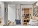 A view of a custom sauna with wood slat decor in a brightly lit living space at 70 King St, Charleston, SC 29401