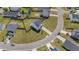 Aerial view of a beautiful home with manicured lawn, fenced backyard, and neighborhood streets at 715 Mcroy St, Moncks Corner, SC 29461