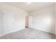 Comfortable bedroom with neutral walls and carpet, featuring two white doors at 715 Mcroy St, Moncks Corner, SC 29461