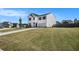 Well-kept two-story home with a two-car garage, lush front lawn, and inviting curb appeal at 715 Mcroy St, Moncks Corner, SC 29461