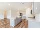 Well-lit kitchen with an island, stainless steel appliances, and ample cabinet space for storage at 715 Mcroy St, Moncks Corner, SC 29461