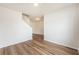 Bright living room with hardwood floors and neutral walls, creating a spacious and inviting atmosphere at 715 Mcroy St, Moncks Corner, SC 29461
