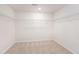 A spacious walk-in closet with carpet and wire shelving for ample storage space at 715 Mcroy St, Moncks Corner, SC 29461