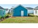 A blue house backyard featuring a well-maintained lawn and minimal landscaping at 816 Gentle Breeze Dr, Summerville, SC 29486
