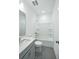 Standard bathroom with tub, toilet, vanity, and gray tile flooring at 816 Gentle Breeze Dr, Summerville, SC 29486