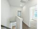 Bright hallway with neutral carpet and doors leading to various rooms at 816 Gentle Breeze Dr, Summerville, SC 29486