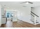 Open living area featuring hardwood floors, recessed lighting, a modern ceiling fan, and stairs at 816 Gentle Breeze Dr, Summerville, SC 29486