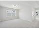 Open loft with ample natural light, neutral tones, and an attic access panel at 825 Alma Square Dr, Moncks Corner, SC 29461
