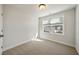 Neutral bedroom with a window and blinds, providing a simple, comfortable space at 827 Alma Square Dr, Moncks Corner, SC 29461