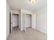 Bedroom featuring carpeted floors, closet, and door to another room at 827 Alma Square Dr, Moncks Corner, SC 29461