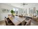 Dining room adjacent to a living room featuring a table and chairs at 827 Alma Square Dr, Moncks Corner, SC 29461