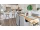 Dining room next to kitchen with a center island with seating at 827 Alma Square Dr, Moncks Corner, SC 29461