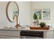 Close-up showcasing a modern kitchen sink with a gold faucet, complemented by elegant decor and marble countertops at 827 Alma Square Dr, Moncks Corner, SC 29461