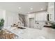 Spacious kitchen featuring a center island, white cabinetry, and stainless steel appliances at 827 Alma Square Dr, Moncks Corner, SC 29461