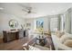 Open-concept living space with a dining area, comfortable seating, and glass doors leading to the outside at 827 Alma Square Dr, Moncks Corner, SC 29461