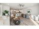 Open living space with a bright kitchen, comfortable seating area, and stylish dining area at 827 Alma Square Dr, Moncks Corner, SC 29461