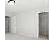 An additional bedroom with neutral walls, carpet flooring, and an open closet at 829 Alma Square Dr, Moncks Corner, SC 29461