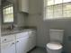 Bathroom featuring granite countertops and a mirror at 8392 Herbert Smalls Rd, Edisto Island, SC 29438