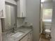 Bathroom featuring granite countertops and a bathtub at 8392 Herbert Smalls Rd, Edisto Island, SC 29438