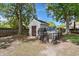 Well-maintained backyard featuring a shed and a chicken coop, ideal for hobbyists and outdoor enthusiasts at 8524 Belford Ct, North Charleston, SC 29420