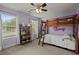 Bright bedroom with a built-in loft bed and a window offering natural light at 8524 Belford Ct, North Charleston, SC 29420