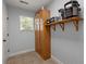 Charming pantry with ample cabinet space and convenient shelf for small appliances at 8524 Belford Ct, North Charleston, SC 29420