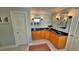 Bathroom with double sink vanity with black countertops and a decorative rug at 855 Hunt Club Run, Charleston, SC 29414