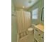 Cozy bathroom with tile flooring and shower with a curtain for added privacy at 855 Hunt Club Run, Charleston, SC 29414