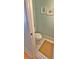 Cozy powder room featuring tiled floor, toilet, and two framed prints at 855 Hunt Club Run, Charleston, SC 29414