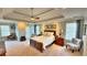 Spacious main bedroom suite with tray ceiling, large windows, and ample natural light at 855 Hunt Club Run, Charleston, SC 29414