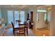 Formal dining room with coffered ceiling, traditional wood furniture, and views of the front door at 855 Hunt Club Run, Charleston, SC 29414