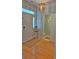 Well-lit foyer featuring a front door, plant stand, and view into half bathroom at 855 Hunt Club Run, Charleston, SC 29414