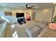 Comfortable living room with a large sectional couch and stylish decor for relaxing and entertaining at 855 Hunt Club Run, Charleston, SC 29414