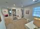 Well-lit office space with built-in bookshelves, a desk and lots of room for working at home at 855 Hunt Club Run, Charleston, SC 29414