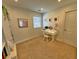 Bright home office featuring a white desk, window, and minimalist decor for a productive workspace at 855 Hunt Club Run, Charleston, SC 29414