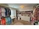 Spacious walk-in closet with custom shelving, storage, and seating at 855 Hunt Club Run, Charleston, SC 29414