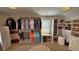 Large walk-in closet with extensive built-in storage and organization at 855 Hunt Club Run, Charleston, SC 29414