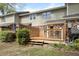 Backyard view featuring a wooden deck and green space at 880 Simpkins St # 2, Charleston, SC 29412