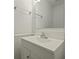 Clean bathroom featuring a vanity with a chrome faucet and framed mirror at 880 Simpkins St # 2, Charleston, SC 29412