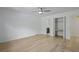 Bright bedroom with hardwood floors, ceiling fan and ensuite bathroom at 880 Simpkins St # 2, Charleston, SC 29412