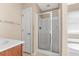 Bathroom featuring a glass-enclosed shower, tub, and modern fixtures at 9226 Southern Oak Ln, Ladson, SC 29456